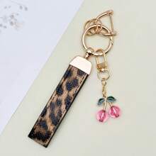 TTOBS 1 Llavero con estampado de leopardo hecho a mano con colgante de cereza - Práctico y versátil llavero ideal para mochilas. Regalo perfecto para el Día de San Valentín o para esa dama especial.