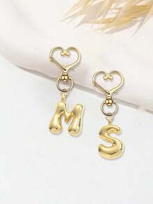 Colgante de letras del alfabeto en forma de burbuja lindas charms - Colgante de cristal de la suerte, letras de amor con cierre dorado de A a Z, colgante de aleación brillante para bolso y mochila - Regalo perfecto para cumpleaños y ocasiones especiales, llavero anillo colgante para bolso mochila coche, accesorios de billetera y bolso para mujeres y niñas - Dorado - Ver 6