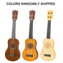 Brinquedo de guitarra mini ukulele infantil - instrumento musical portátil, brinquedo musical de aprendizagem precoce para crianças em idade pré-escolar de 3 a 5 anos, presente para iniciantes em ukulele para meninos e meninas a partir de 3 anos (cor aleatória)