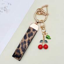 TTOBS 1 Llavero con estampado de leopardo hecho a mano con colgante de cereza - Práctico y versátil llavero ideal para mochilas. Regalo perfecto para el Día de San Valentín o para esa dama especial.