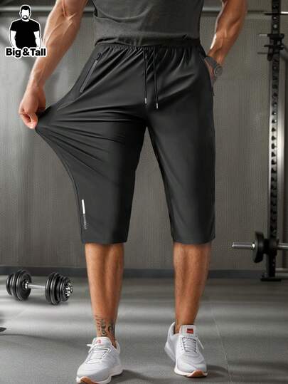 بنطلون طول الساق للرجال كبار الحجم من قماش مرن وقابل للتنفس مع خصر مرباط وجيوب سحاب، مناسب للجيم والجري والملابس الكاجوال، لون أسود عاكس