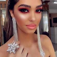 Par de pendientes con colgantes de cristal, elegantes y sensuales, para uso en discoteca, para mujeres