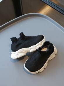 Zapatillas deportivas slip-on ligeras y cómodas de punto negro y blanco casuales para niños
