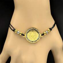 Pulsera ajustable con cadena de cuerda, con medalla de San Benito en color dorado de acero inoxidable, para hombres y mujeres