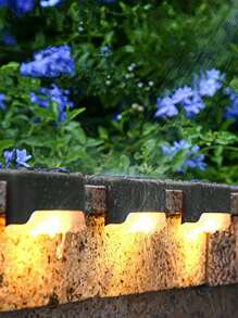 4 piezas Luces decorativas solares para exterior, 1 LED luz cálida, luces de cubierta - Carcasa negra, luces de pared, luces solares para jardín valla, luces solares para patio y escaleras, regalo para Halloween, Navidad y Acción de Gracias