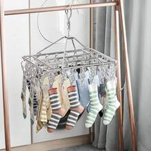 Perchero Portátil de Metal con 80 Pinzas y Ganchos Rotativos - 1 - Ver 7