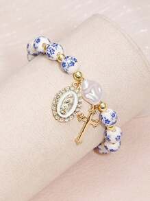 1 pièce Magnifique et délicat bracelet en céramique avec perles dorées et perles baroques artificielles, avec Vierge Marie et pendentif en acier inoxydable. Un excellent cadeau/bijou chrétien/cadeau chrétien