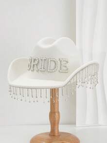 1 chiếc mũ cưới nữ màu trơn bóng. Thiết kế mặt dây chuyền pha lê sang trọng độc đáo, kết hợp với chữ "BRIDE" bằng ngọc trai giả, kiểu dáng punk mới lạ và thú vị, mũ cưới vành rộng lấy cảm hứng từ KJ. Vẻ đẹp thanh lịch. Thích hợp cho các buổi hóa trang, tiệc theo chủ đề, tiệc đính hôn, tiệc trang phục, lễ hội, đám cưới kiểu phương Tây, và là phụ kiện không thể thiếu cho đám cưới năm 2024, thể hiện vẻ duyên dáng. - trắng - Xem 7