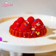 Set de Squishies LUMEE - Squishies ultra blandos con pudín de yogurt, mozzarella frita, gato con queso y talla grande - Excelentes aliviadores de estrés para todas las edades - Gran regalo - Rojo - Ver 1