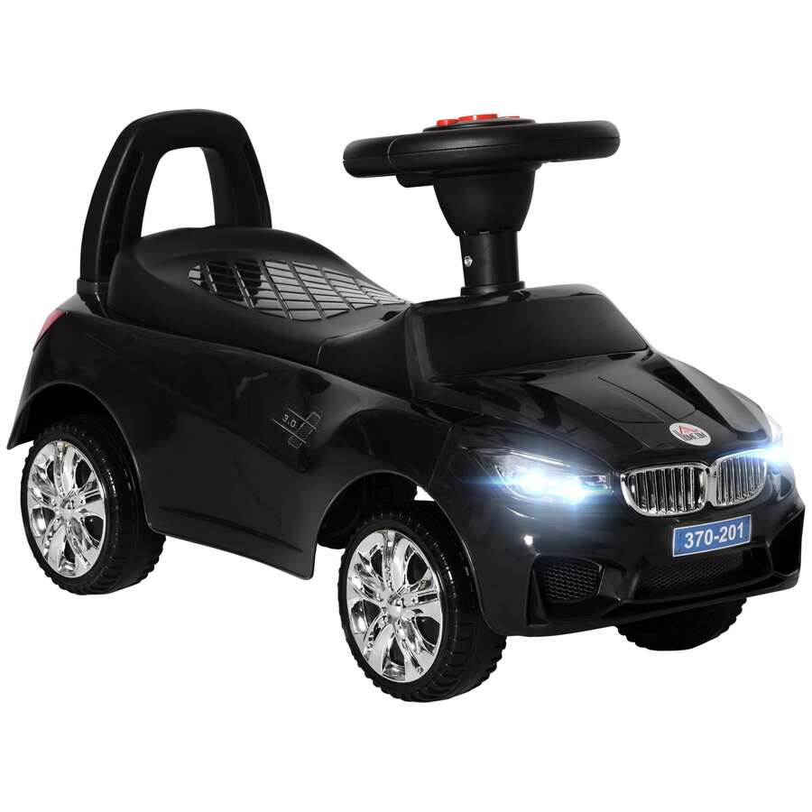 HOMCOM Macchinina per Bambini Cavalcabile con Volante, Fari e Musiche Integrate, Età 18-36 Mesi, 63.5x28x36cm