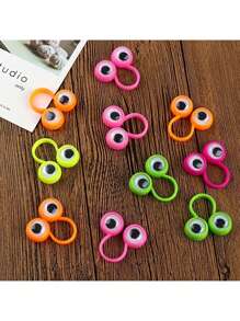 5 pièces Anneaux de doigt à activation par les doigts, décoration de fête d'anniversaire créative avec gros yeux de doigt en forme de boule oculaire. (Couleurs aléatoires)
