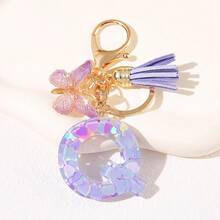 Geschenke für Thanksgiving, Weihnachten, Abschluss, Geburtstage und Feste - Niedliche Schlüsselanhänger mit Initialbuchstaben in lila, goldener Folien-Schlüsselanhänger-Charm mit Buchstaben und Schmetterling-Quaste, modischer Schlüsselanhänger als Geschenk für Frauen für Geldbörse, Tasche, Handtasche Dekoration