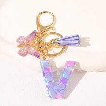 Geschenke für Thanksgiving, Weihnachten, Abschluss, Geburtstage und Feste - Niedliche Schlüsselanhänger mit Initialbuchstaben in lila, goldener Folien-Schlüsselanhänger-Charm mit Buchstaben und Schmetterling-Quaste, modischer Schlüsselanhänger als Geschenk für Frauen für Geldbörse, Tasche, Handtasche Dekoration