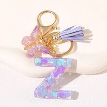 Geschenke für Thanksgiving, Weihnachten, Abschluss, Geburtstage und Feste - Niedliche Schlüsselanhänger mit Initialbuchstaben in lila, goldener Folien-Schlüsselanhänger-Charm mit Buchstaben und Schmetterling-Quaste, modischer Schlüsselanhänger als Geschenk für Frauen für Geldbörse, Tasche, Handtasche Dekoration