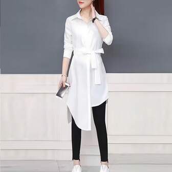 别致的常规版型女式翻领衬衫，具有独特的不对称下摆和领带细节