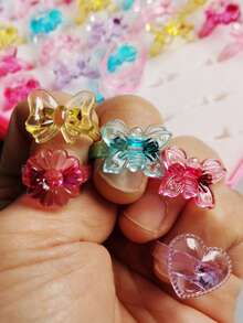 (Sin caja) Set de 10 anillos de dedo de resina con flores de caramelo, anillos de plástico rosa para niñas, regalos para fiestas, cumpleaños y joyería aleatoria para niñas - A - Ver 6