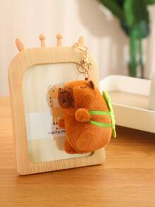 Adorable peluche de capibara color marrón oscuro con acentos de hojas verdes - Peluche de poliéster suave, ideal para regalos de Navidad y Acción de Gracias