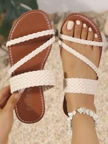 Sandalias planas con tira entre los dedos para mujeres, estilo juvenil europeo y americano, unicolor, diseño sencillo de trenzado, moda versátil, ligeras, chanclas de playa para vacaciones