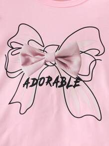 Conjunto de camiseta con estampado de lazo y pantalones con estampado de mezclilla sintética, estilo casual de moda para niña en verano