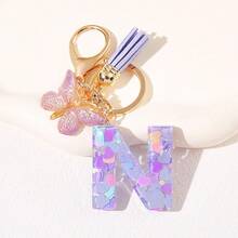 Geschenke für Thanksgiving, Weihnachten, Abschluss, Geburtstage und Feste - Niedliche Schlüsselanhänger mit Initialbuchstaben in lila, goldener Folien-Schlüsselanhänger-Charm mit Buchstaben und Schmetterling-Quaste, modischer Schlüsselanhänger als Geschenk für Frauen für Geldbörse, Tasche, Handtasche Dekoration