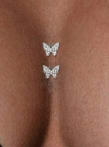 1 par de adhesivos con diseño de mariposa de moda en color plateado para el escote