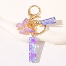 Geschenke für Thanksgiving, Weihnachten, Abschluss, Geburtstage und Feste - Niedliche Schlüsselanhänger mit Initialbuchstaben in lila, goldener Folien-Schlüsselanhänger-Charm mit Buchstaben und Schmetterling-Quaste, modischer Schlüsselanhänger als Geschenk für Frauen für Geldbörse, Tasche, Handtasche Dekoration