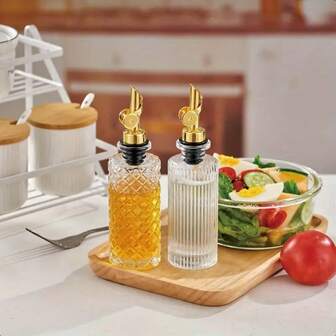 1 pieza Botella dispensadora de aceite de oliva de vidrio de 6.5oz/200ml, botella simple de jarabe de café con embudo de metal dorado y taza medidora, para la cocina