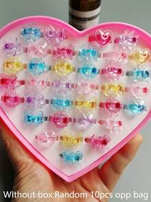 (Sin caja) Set de 10 anillos de dedo de resina con flores de caramelo, anillos de plástico rosa para niñas, regalos para fiestas, cumpleaños y joyería aleatoria para niñas - A - Ver 3