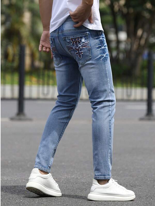 Jean en denim délavé et déchiré de style décontracté de rue pour hommes, coupe ajustée, streetwear, sport et extérieur