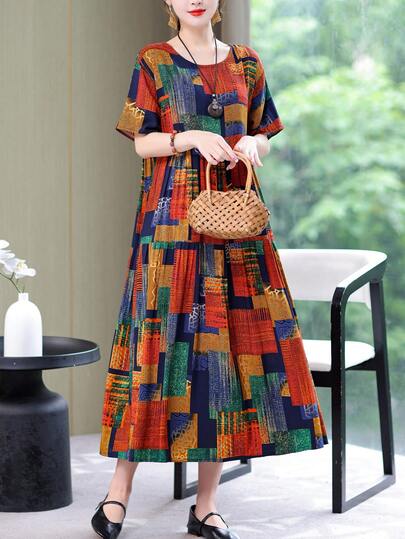 Đầm dài ngang gối in họa tiết thời trang mùa hè mới, kiểu dáng thanh lịch, thích hợp cho nữ đi nghỉ mát.