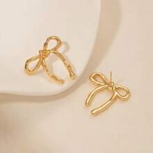 Versatile And Elegant Earrings, Women's European And American Gold Bow Earrings Are Hot Selling And Popular, Fashionable, Simple, Smooth And Elegant Earrings