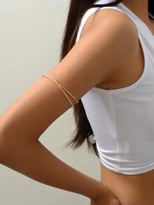 1 件简约空心线包裹金属多层十字架手镯，可调节