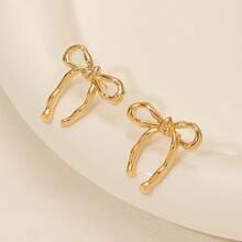 Versatile And Elegant Earrings, Women's European And American Gold Bow Earrings Are Hot Selling And Popular, Fashionable, Simple, Smooth And Elegant Earrings