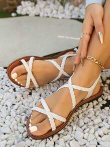 Sandalias planas para mujer, estilo romano de verano con puntera abierta, correa trenzada sin respaldo, calzado cómodo de verano para uso diario, diseño de puntera abierta a la moda, transpirable, sandalias casuales versátiles, adecuadas para cualquier atuendo en colores negro, blanco y marrón