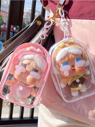 1 pieza Bolsa de exhibición de personaje transparente divertida con llavero - Caja ciega Estuche portátil, Bolsa de almacenamiento colgante, Accesorio de bolsa de llavero, Coleccionable, Bolsa de almacenamiento a prueba de polvo, Caja de exhibición colgante, Cubierta protectora, Conveniente para colgar en la mochila, Regalo ideal para fans, amigos, recuerdos de fiesta, puede contener cosméticos, cajas ciegas, pequeñas figuritas, accesorios (muñeca no incluida)