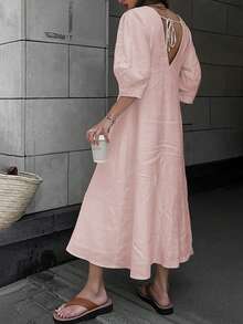 فستان طويل بأكمام منتفخة واسع فضفاض بلون واحد سادة أسلوب الإجازة الفرنسي العصري الصيفي والربيعي الجديد ذو فتحة الرقبة على شكل حرف V عاري الظهر