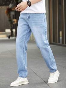 欧美青少年浅蓝色男士做旧猫须休闲风修身直筒牛仔裤