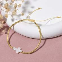 1 Stück legeres minimalistisches Perlen-Armband mit 4-Blatt Klee und Muschel, verstellbar, geeignet für den täglichen Gebrauch von Frauen und für den Urlaub, tolles Geschenk für den Geburtstag