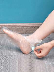 100/200 piezas Máscara de pie desechable de plástico, protector de pie hidratante y a prueba de grietas, suave, cómodo, hidratante y transparente, muy adecuado para el uso diario con crema corporal, imprescindible para el spa casero y los viajes (color de pegatina fija aleatorio)