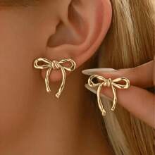 Versatile And Elegant Earrings, Women's European And American Gold Bow Earrings Are Hot Selling And Popular, Fashionable, Simple, Smooth And Elegant Earrings