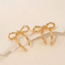 Versatile And Elegant Earrings, Women's European And American Gold Bow Earrings Are Hot Selling And Popular, Fashionable, Simple, Smooth And Elegant Earrings