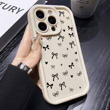 Funda para phone (1 unidad) con diseño de corazón, estrella y lazo. Compatible con phone 16 Pro Max, 15 Plus, 14, 13, 12, 11 y XS. Fabricada en silicona TPU, protege contra golpes y caídas. Ideal para chicas y mujeres. - Blanco marfil - Ver 3