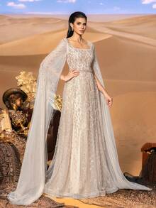 Faeriesty Đầm dạ hội lấp lánh quyến rũ, được tô điểm bằng những họa tiết thêu đính cườm và tay áo voan mỏng, thiết kế cổ vuông, phù hợp cho các sự kiện thảm đỏ, dạ tiệc lấy cảm hứng từ Trung Đông và tiệc cưới sang trọng. Thích hợp cho tiệc cưới, dạ hội, tiệc tùng, thanh lịch, mùa xuân. - Rượu sâm banh - Xem 7