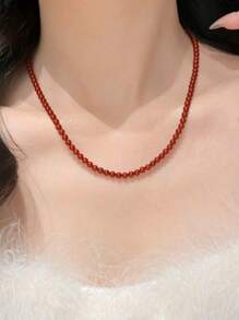 A Fashionable And Individualistic Rhinestone-Encrusted Double-Layered Necklace
