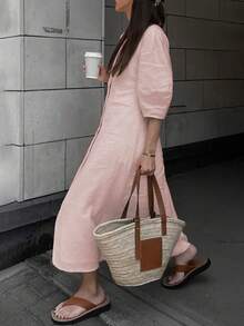 فستان طويل بأكمام منتفخة واسع فضفاض بلون واحد سادة أسلوب الإجازة الفرنسي العصري الصيفي والربيعي الجديد ذو فتحة الرقبة على شكل حرف V عاري الظهر