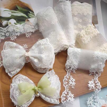 带蝴蝶结的刺绣蕾丝边裙摆工艺用品、缝纫配件、服装装饰品