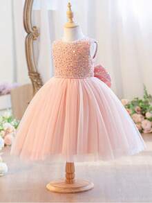 Váy đính sequin hồng cao cấp cho bé gái, trang trí nơ lớn, phù hợp cho tiệc sinh nhật, dẫn chương trình, biểu diễn sân khấu, thi đọc thơ và các dịp quan trọng khác. Mặc lên vừa nổi bật vừa thanh lịch. - Hồng - Xem 3