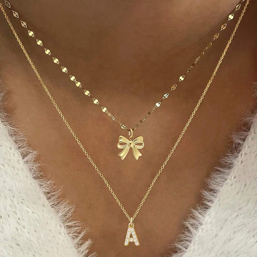 2件套经典金色字母蝴蝶结吊坠唇链颈链不锈钢多层链项链，女士款 - 金黃色微鑲字母 - 查看 1