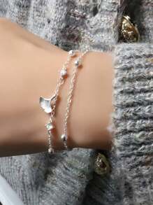 Armband aus Sterling Silber mit eingearbeiteten Strass-Ginkgoblättern, kleines apricot-farbenes Glücksarmband als Doppelschicht Perlenarmband, Mori Stil Blätter künstlerischer Stil und elegante Frauen