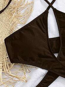 Nuevo traje de baño de una pieza con escote en V y abertura cruzada estilo europeo y americano para mujeres